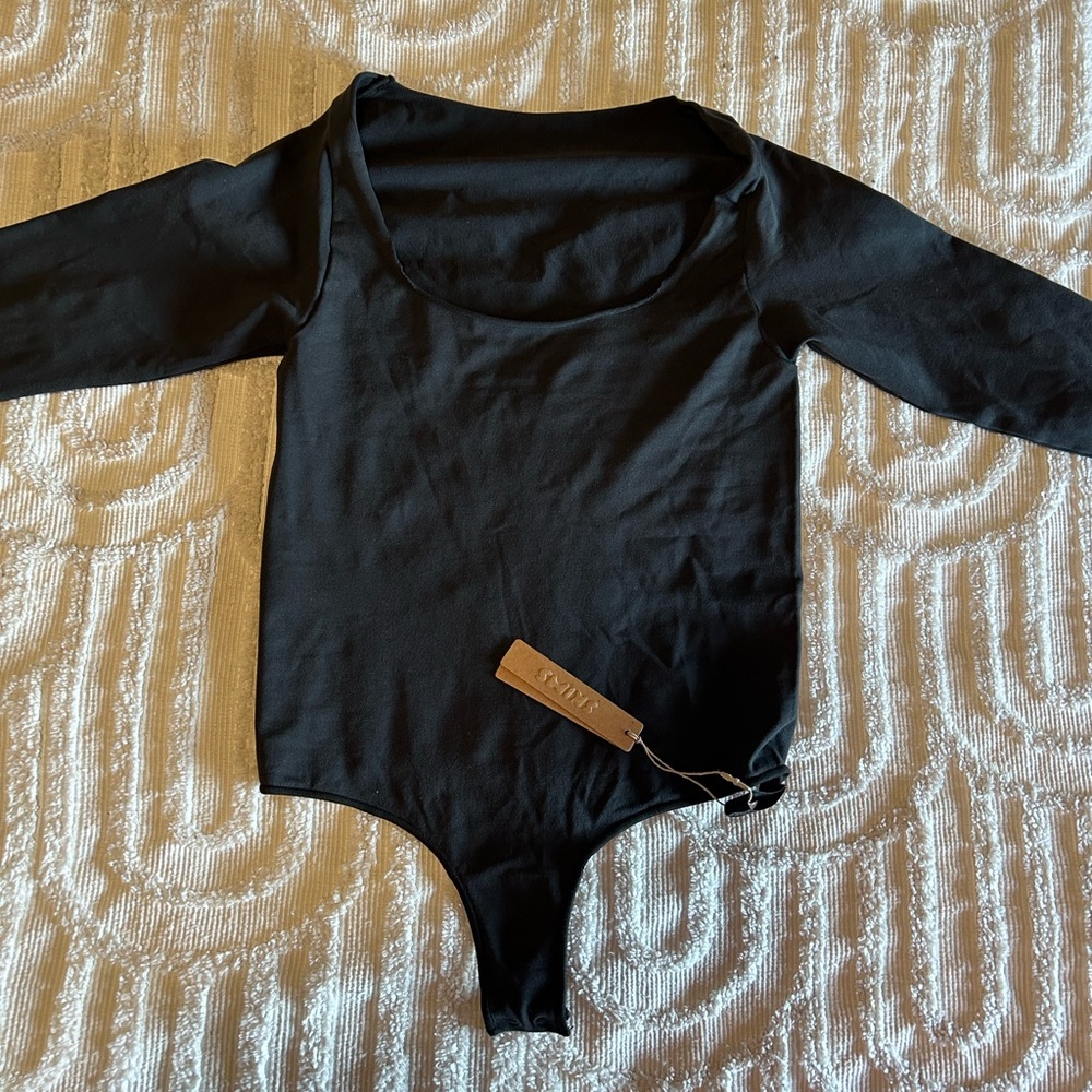 Skims body suit